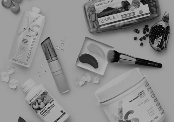 Product shot of Amway makeup products, shot in black and white