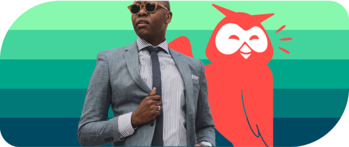 Stylish man in suit next to Owly