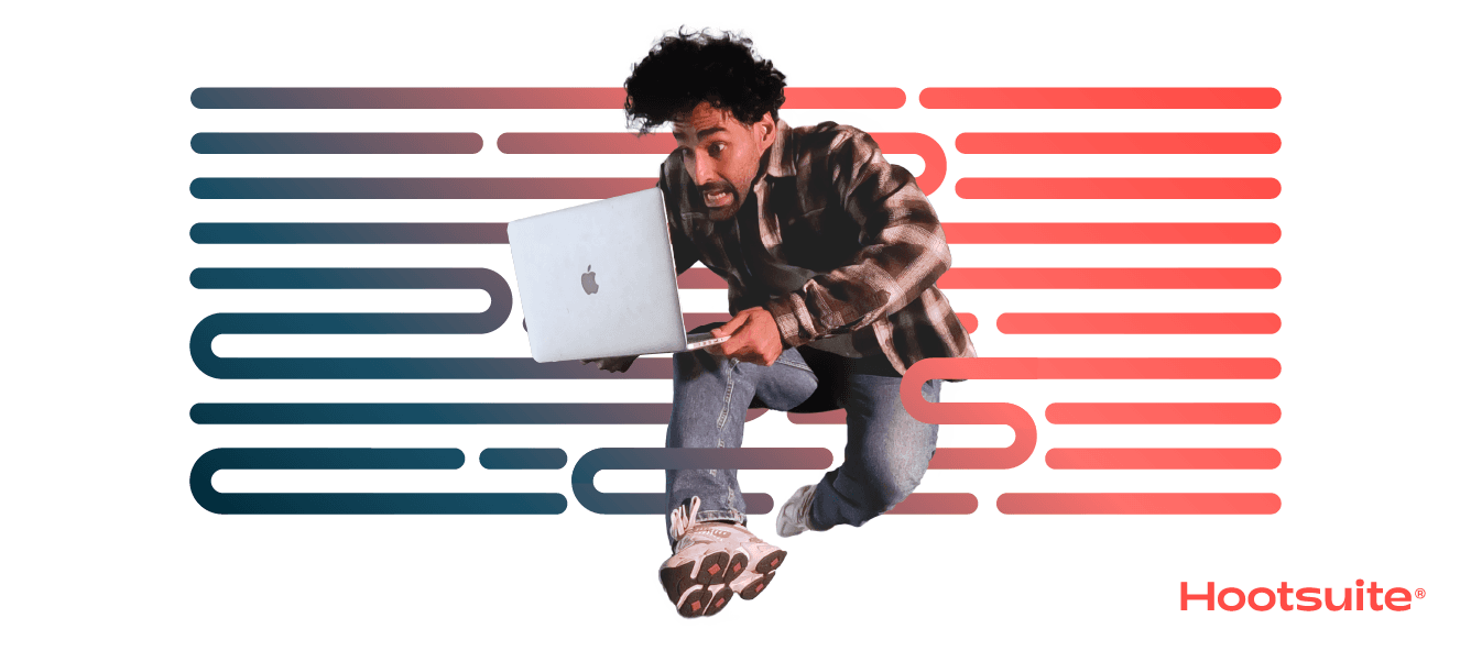 Guy jumping with computer