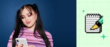 A woman with pig tails in her hair, smiling and looking down at her phone